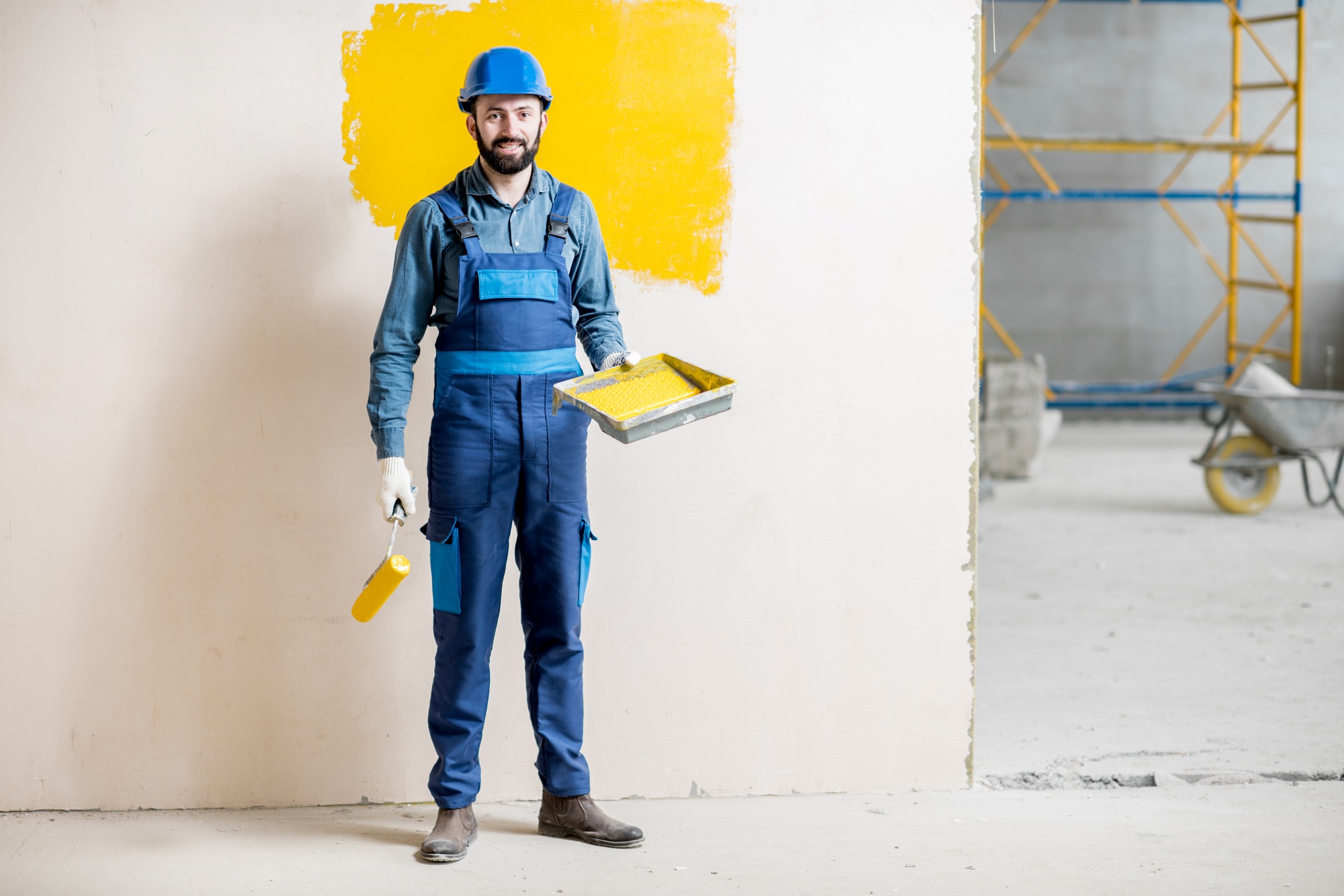 Painter at the construction site